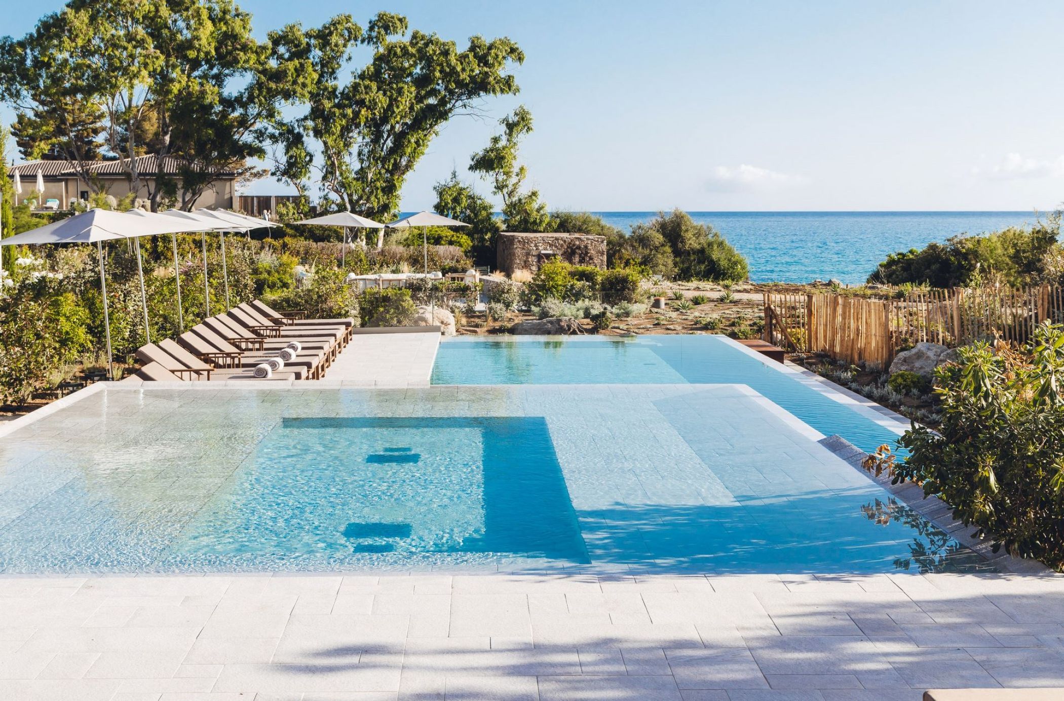 The swimming pool of the 5 star hotel in Corsica at Ile Rousse